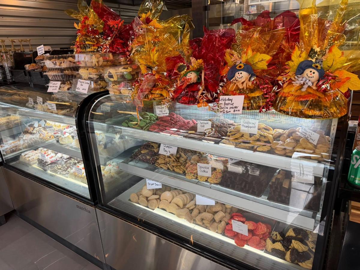 Holiday traditions at Bagel Chicks featuring festive cookie platters and gift baskets celebrating food, community, and holiday spirit.
