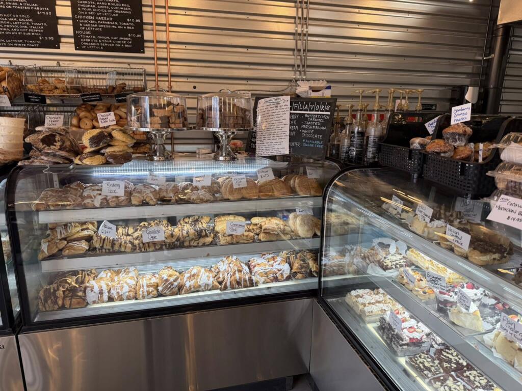 Pastry cases and baked goods inside Bagel Chicks in Ranson, West Virginia bakery.